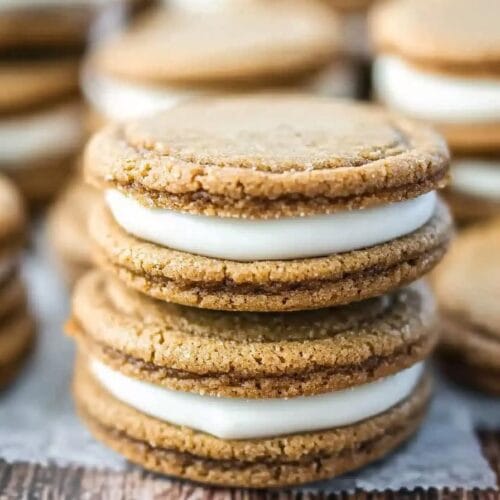 Ginger Molasses Sandwich Cookies with Eggnog Frosting